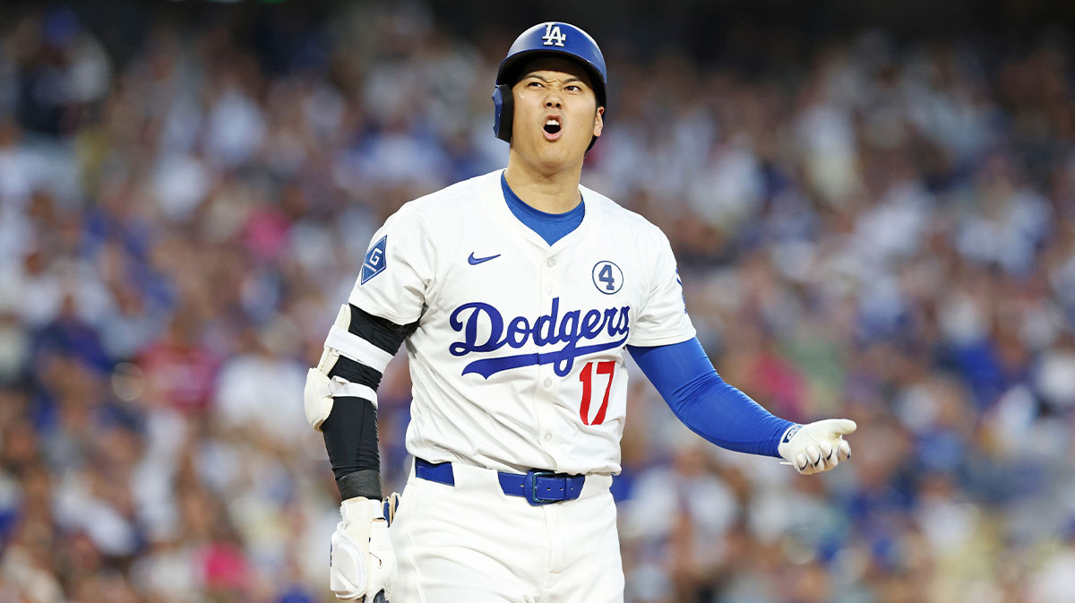 Los Angeles Dodgers two-way player Shohei Ohtani (17) reacts after a hit during the third inning against the New York Mets during the third inning against the New York Mets at Dodger Stadium.