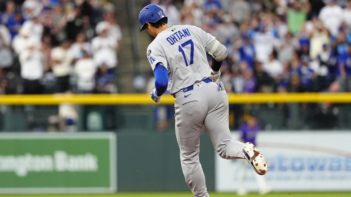 Los Angeles Dodgers two-way player Shohei Ohtani (17) runs off a two-run home run in the sixth inning against the Colorado Rockies at Coors Field.