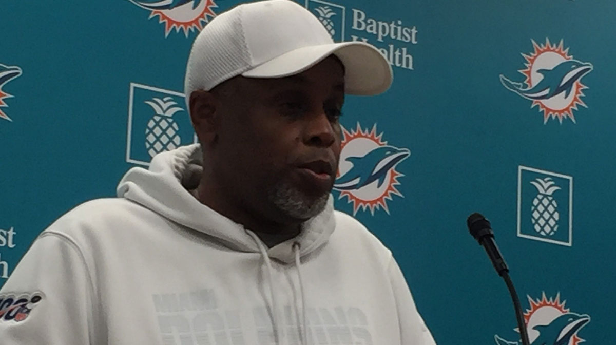Miami Dolphins general manager Chris Grier addresses reporters