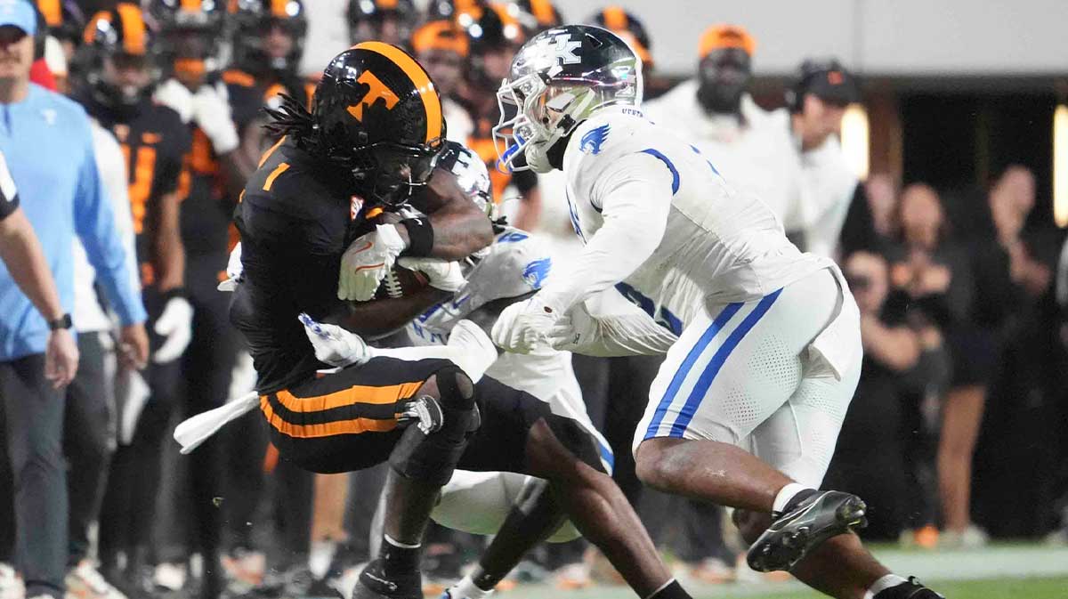 Tennessee wide receiver Dont'e Thornton Jr. (1) is tackled by Kentucky during a game between Tennessee and Kentucky at Neyland Stadium in Knoxville, Tenn., Saturday, Nov. 2, 2024