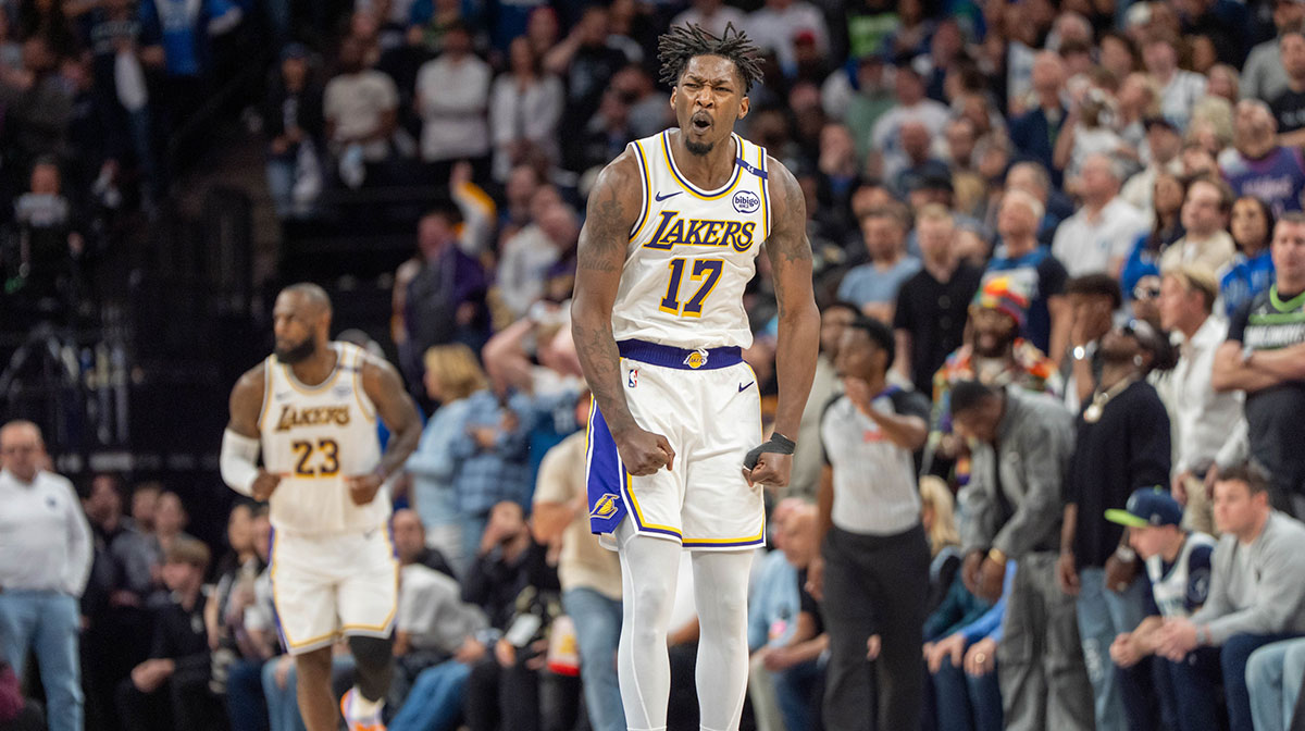 Los Angeles Lakers forward Dorian Finney-Smith (17) celebrates after scoring a three pointer agains the Minnesota Timberwolves in the fourth quarter during game four of first round for the 2025 NBA Playoffs at Target Center.