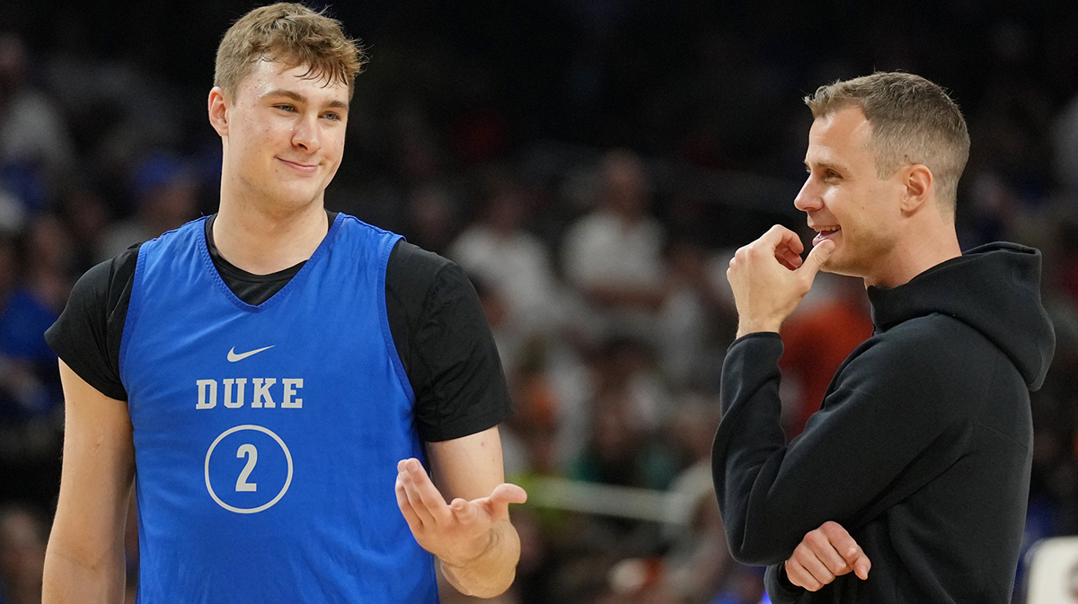 Duke Blue Devils guard Cooper Flagg (2) talks with head coach Jon Scheyer during a practice session for the Final Four of the 2025 NCAA tournament at Alamodome.