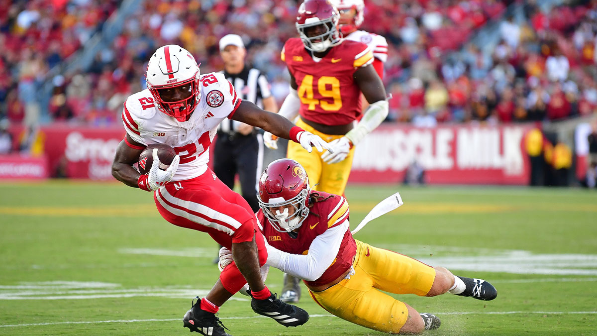 Nebraska Cornhuskers defensive back Dwight Bootle II (21) moves the ball against Southern California Trojans linebacker Mason Cobb (13) during the second half at the Los Angeles Memorial Coliseum.