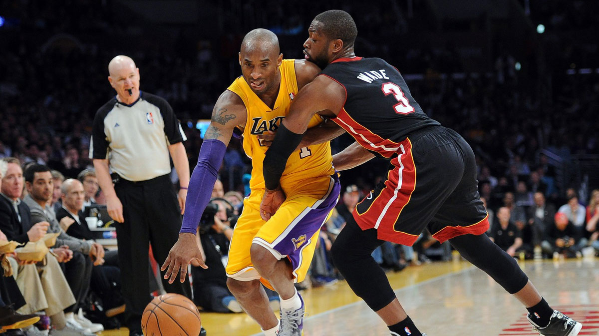 Miami Heat shooting guard Dwyane Wade (3) guards Los Angeles Lakers shooting guard Kobe Bryant (24) in the second half of the game at the Staples Center. Heat won 99-90.