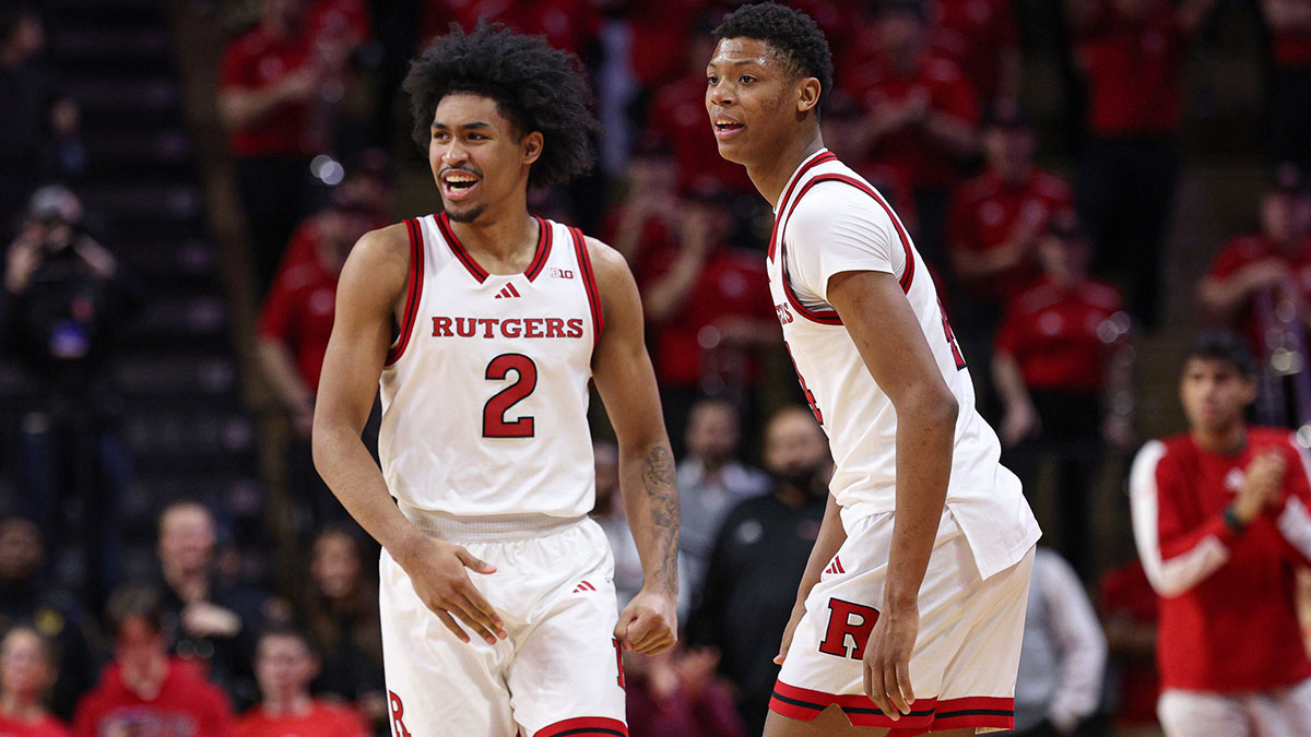 Rutgers Scarlet Knights guard Dylan Harper (2) celebrates in front of guard Ace Bailey (4) during the second half against the UCLA Bruins at Jersey Mike's Arena.