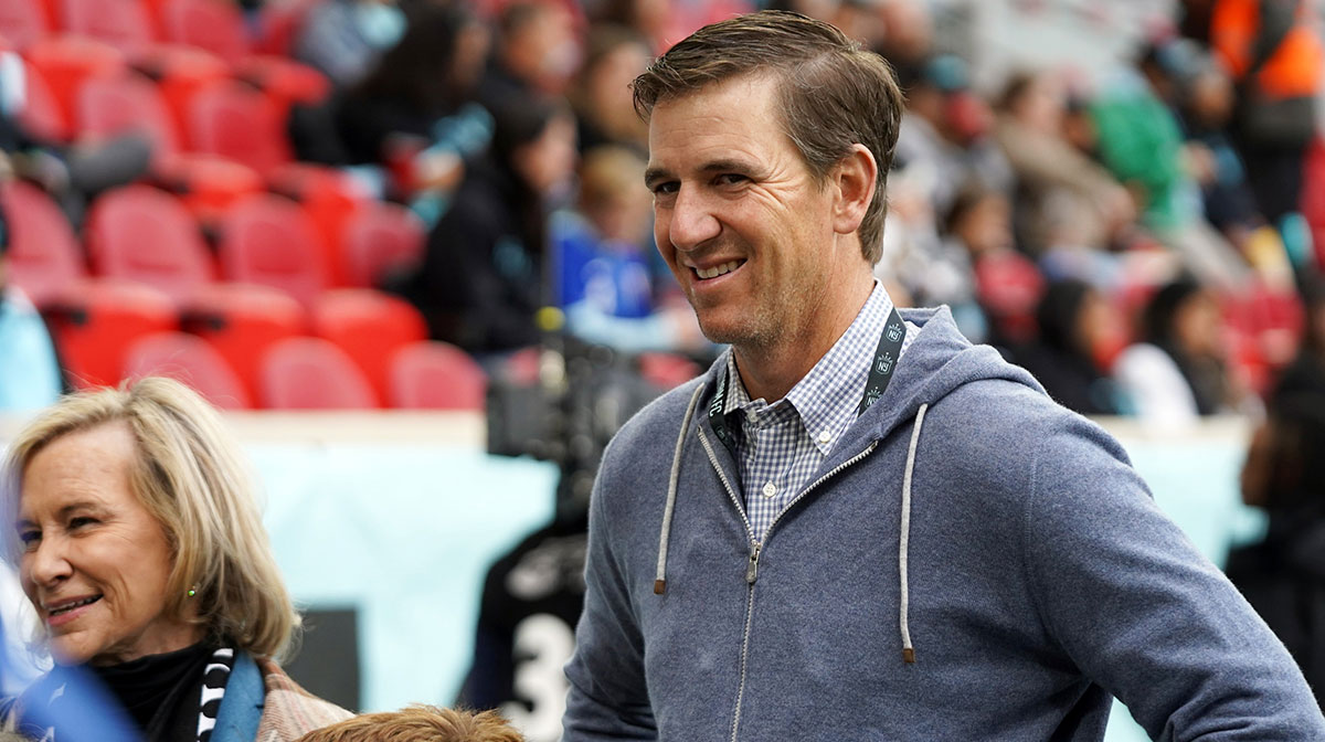 New York Giants legendary quarterback Eli Manning, who may have given Jaxson Dart advice at Fanatics Fest, at NWSL Playoffs game.