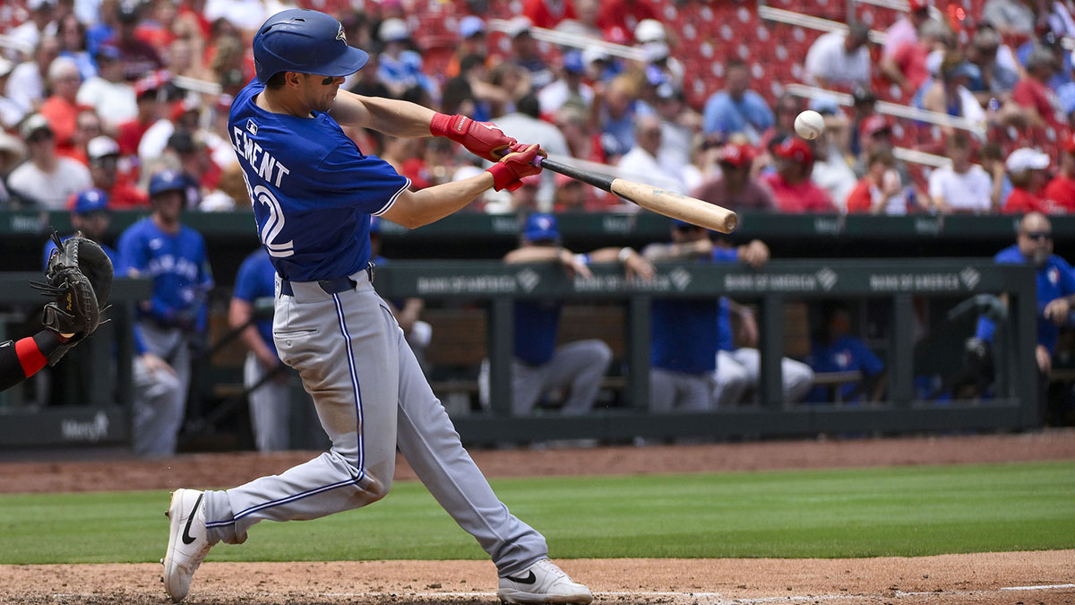 Toronto Blue Jays third baseman Ernie Clement (22) hits a solo home run against the St. Louis Cardinals during the fifth inning at Busch Stadium