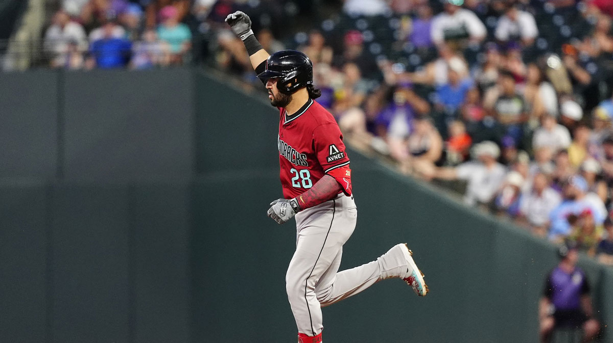 Jun 20, 2025; Denver, Colorado, USA; Arizona Diamondbacks third baseman Eugenio Suarez (28) celebrates his two run home run in the sixth inning against the Colorado Rockies at Coors Field. Mandatory Credit: Ron Chenoy-Imagn Images