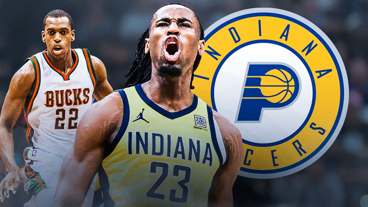 Pacers forward Aaron Nesmith (same picture) with Pacers logo right next to him, and Khris Middleton (same picture) in the way back with Nesmith and Pacers logo at the forefront