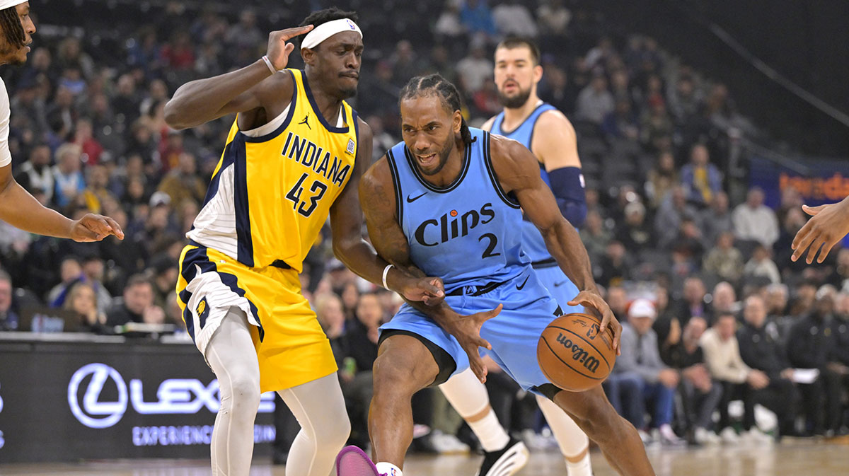 Los Angeles Clippers forward Kawhi Leonard (2) is defended by Indiana Pacers forward Pascal Siakam (43) as he drives to the basket in the first half at Intuit Dome.