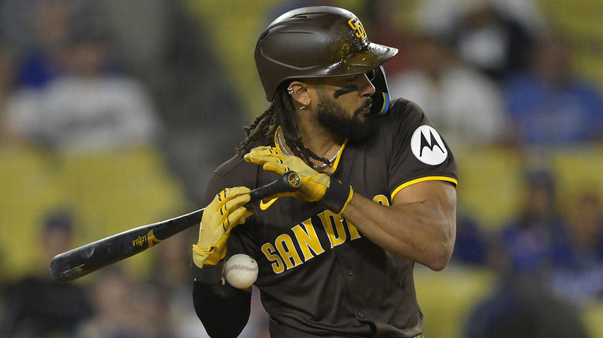 San Diego Padres right fielder Fernando Tatis Jr. (23) reacts as he is hit by a pitch in the eighth inning against the Los Angeles Dodgers at Dodger Stadium.