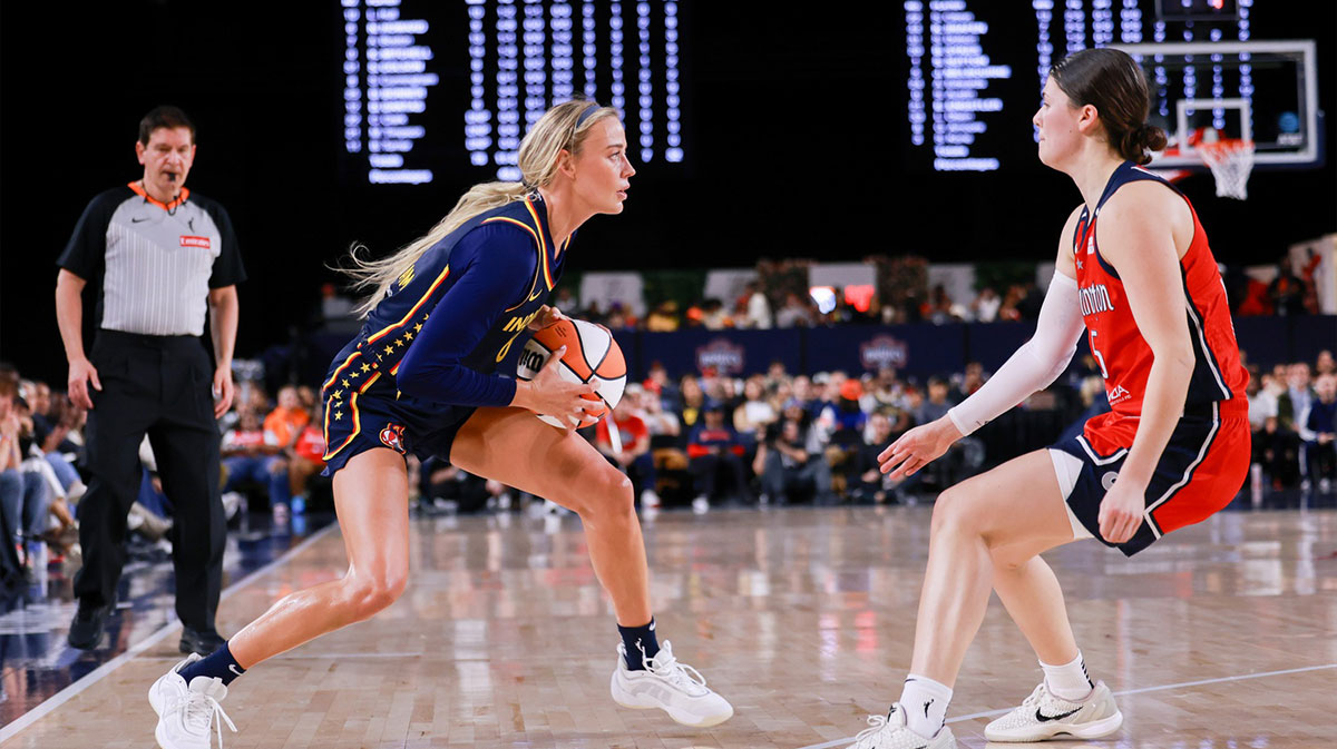 Indiana Fever guard Sophie Cunningham controls the ball while Washington Mystics guard Jade Melbourne defends in the first quarter at Entertainment & Sports Arena.