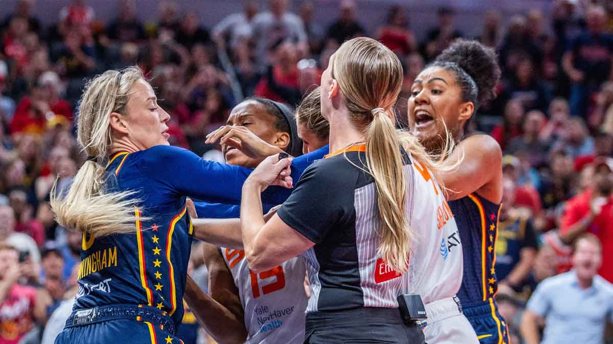 Indiana Fever guard Sophie Cunningham (8) and Connecticut Sun guard Jacy Sheldon (4) get into a fight in the second half at Gainbridge Fieldhouse.