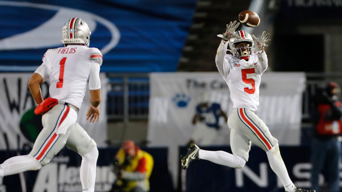 Ohio State Buckeyes quarterback Justin Fields (1) throws a pass to wide receiver Garrett Wilson (5) during the NCAA football game at Beaver Stadium in University Park, Pa. on Sunday, Nov. 1, 2020. Ohio State Faces Penn State In Happy Valley
