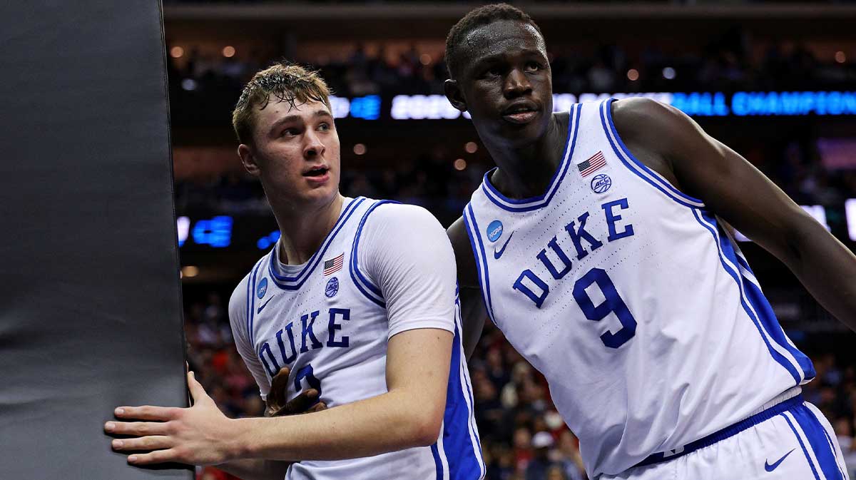 Duke Blue Devils forward Cooper Flagg (2) reacts with center Khaman Maluach (9) during the second half against the Arizona Wildcats during an East Regional semifinal of the 2025 NCAA tournament at Prudential Center.