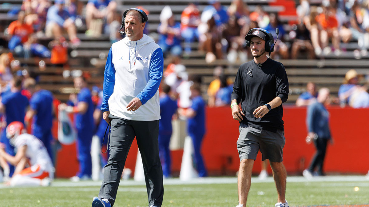 Florida Gators head coach Billy Napier walks on the field during the second half at Ben Hill Griffin Stadium.