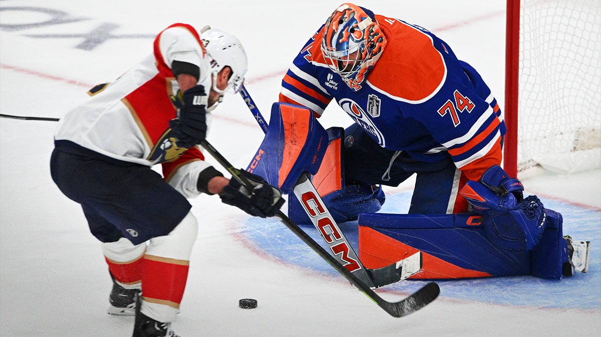 Florida Panthers center Brad Marchand (63) scores the game winning goal against Edmonton Oilers goaltender Stuart Skinner (74) during double overtime in game two of the 2025 Stanley Cup Final at Rogers Place.
