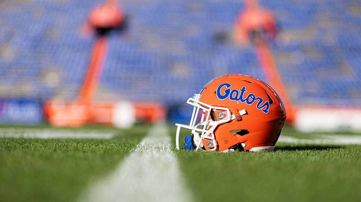 A Florida Gators helmet sits on the field before a game against the Mississippi Rebels at Ben Hill Griffin Stadium.
