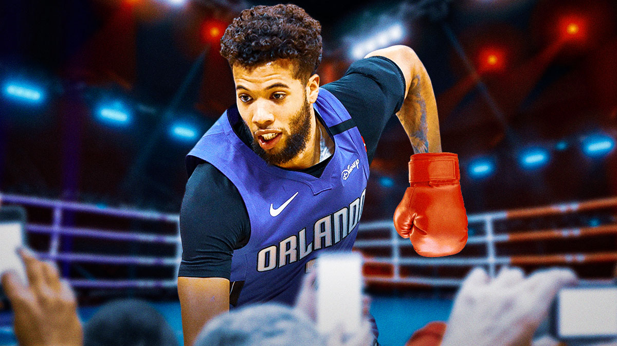 Michael Carter-Williams in a boxing ring with boxing gloves