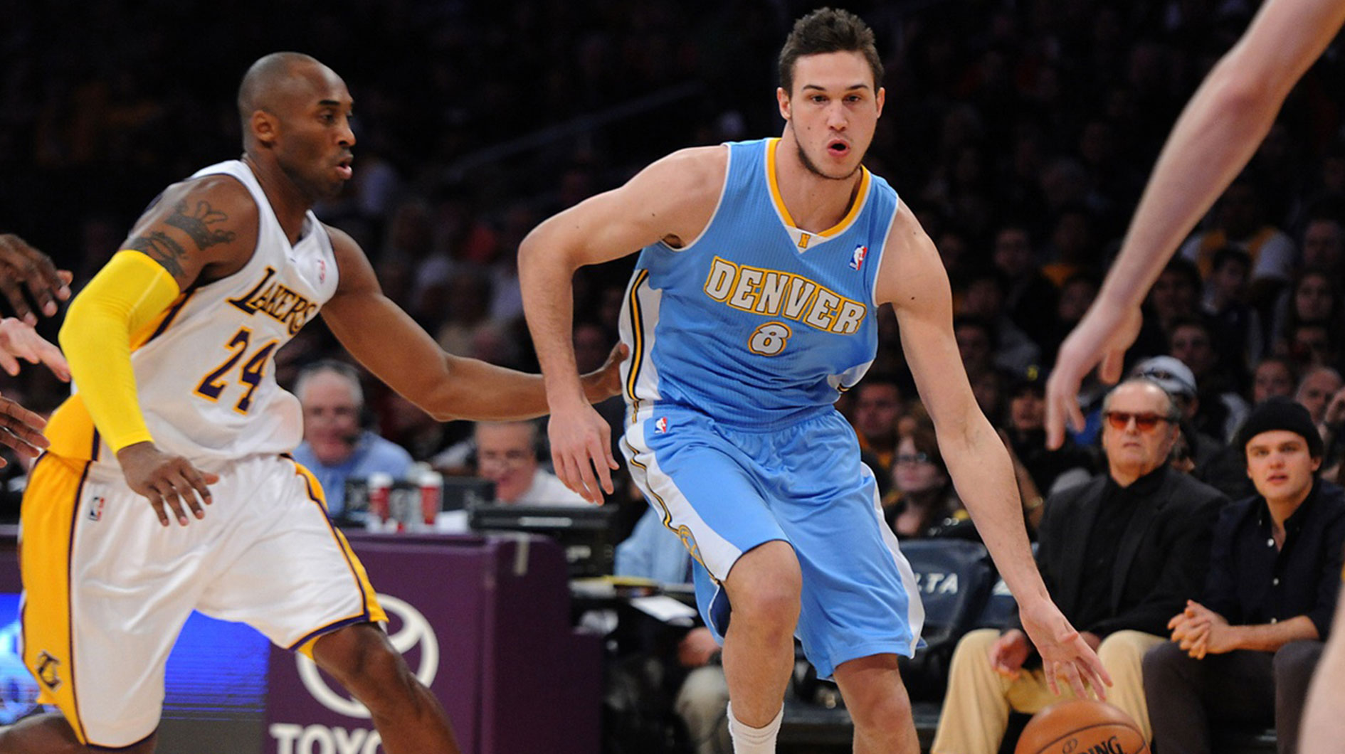 Los Angeles Lakers shooting guard Kobe Bryant (24) guards Denver Nuggets small forward Danilo Gallinari (8) in the first half at the Staples Center. NBA