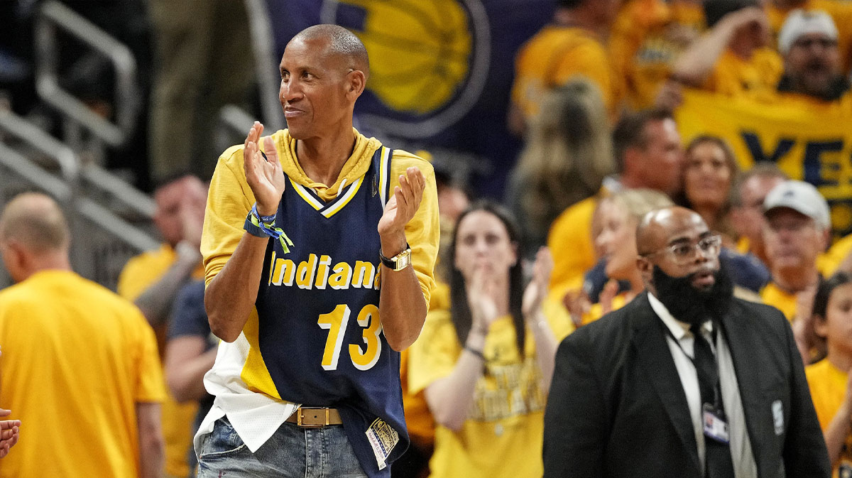 Former Pacers player Reggie Miller celebrates