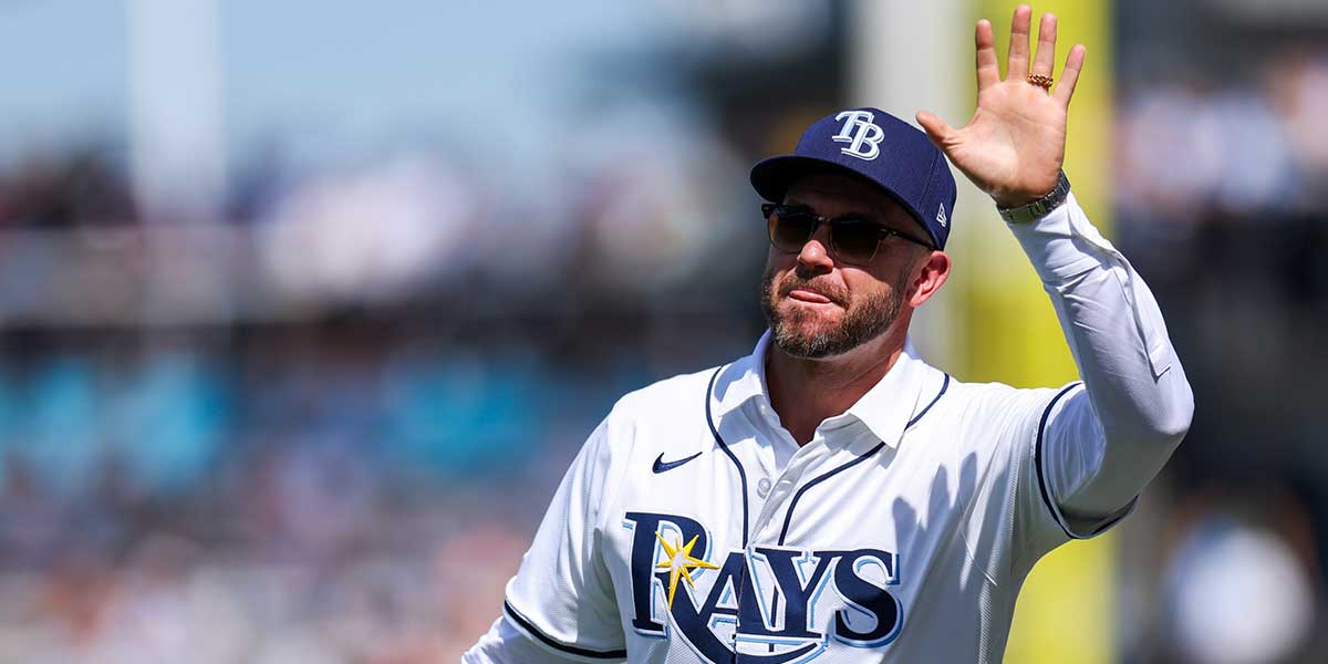 Former Tampa Bay Rays third baseman Evan Longoria (3) throws out the first pitch before a game against the Miami Marlins at George M. Steinbrenner Field.