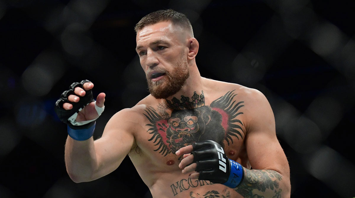 Conor McGregor fights Dustin Poirier during UFC 264 at T-Mobile Arena.