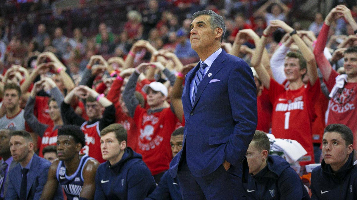 Villanova Wildcats head coach Jay Wright watches as an Ohio State Buckeyes players shoots free throws during the first half of the NCAA men's basketball game at Value City Arena in Columbus.