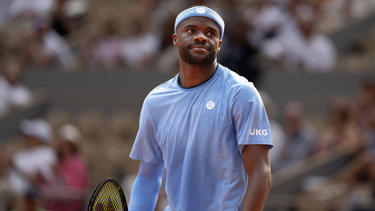 Frances Tiafoe of the United States reacts to a point during his match against Lorenzo Musetti of Italy on day 10 at Roland Garros Stadium.