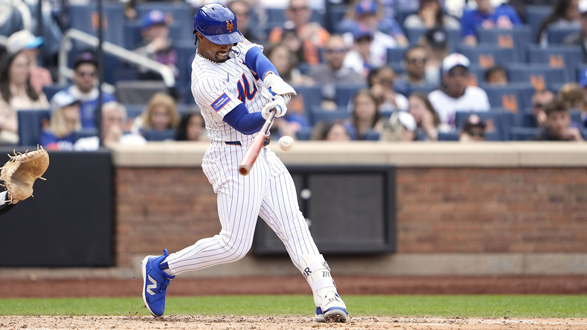 Jun 1, 2025; New York City, New York, USA; New York Mets shortstop Francisco Lindor (12) hits a home run against the Colorado Rockies during the fifth inning at Citi Field. 