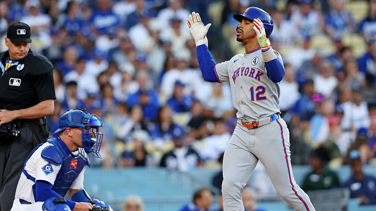 Jun 2, 2025; Los Angeles, California, USA; New York Mets shortstop Francisco Lindor (12) rounds the bases during the first inning against the Los Angeles Dodgers during the first inning against the New York Mets at Dodger Stadium. Mandatory Credit: Jason Parkhurst-Imagn Images