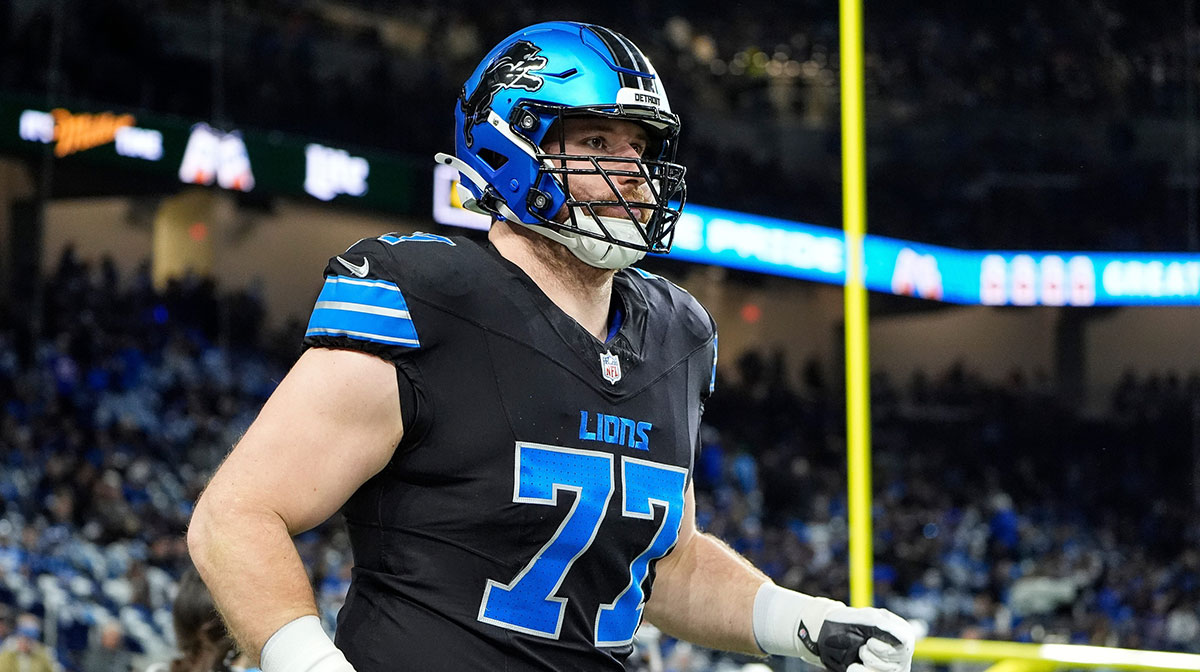 Detroit Lions center Frank Ragnow (77) warm up before the game between Detroit Lions and Buffalo Bills at Ford Field in Detroit on Sunday, Dec. 15, 2024.