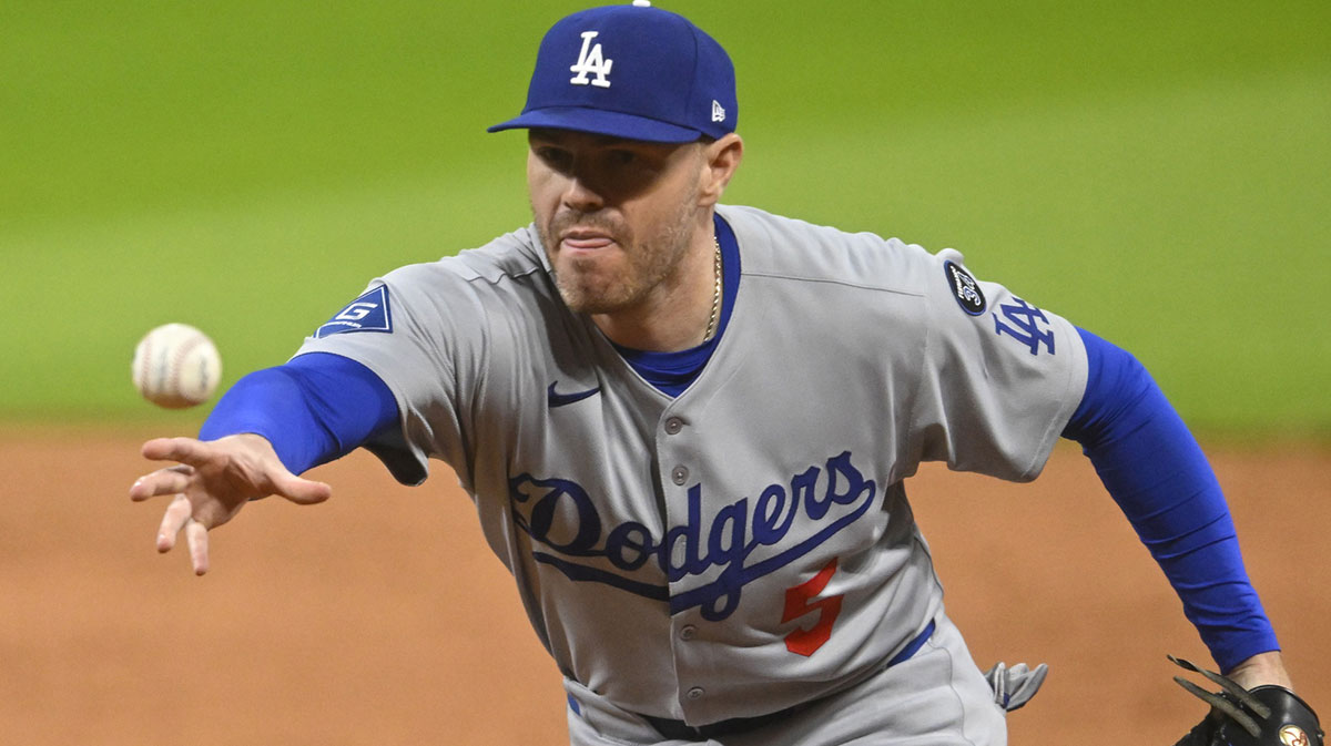 Los Angeles Dodgers first baseman Freddie Freeman (5) tosses the ball to first base in the ninth inning.