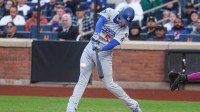 Los Angeles Dodgers first baseman Freddie Freeman (5) doubles during the first inning against the New York Mets at Citi Field.
