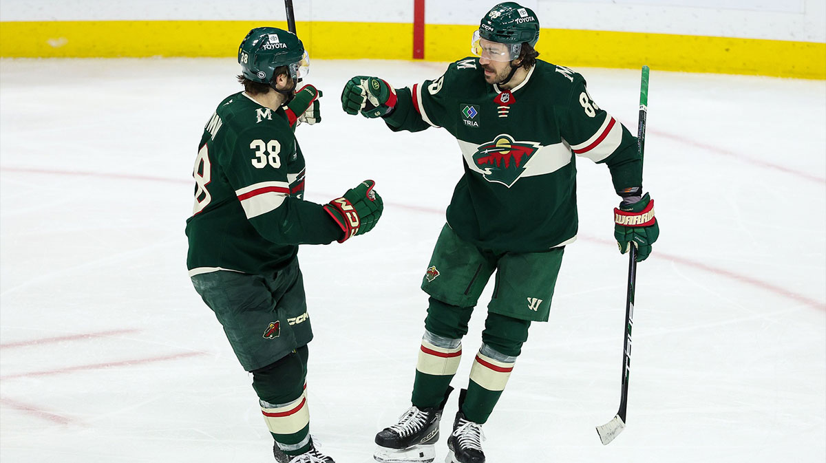 Minnesota Wild center Frederick Gaudreau (89) celebrates his goal with right wing Ryan Hartman (38) during the third period against the New York Rangers at Xcel Energy Center.