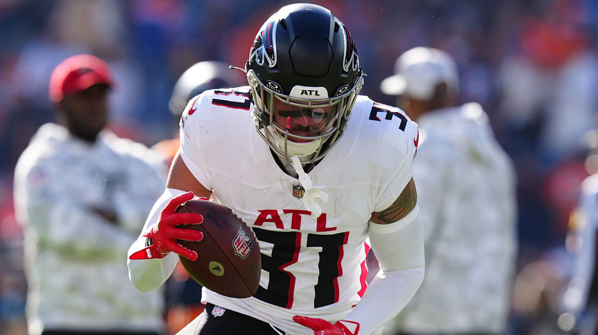Atlanta Falcons safety Justin Simmons (31) warms up before the game against the Denver Broncos at Empower Field at Mile High.