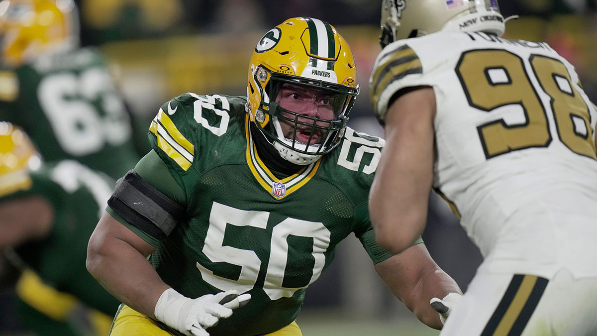 Green Bay Packers guard Zach Tom (50) blocks New Orleans Saints defensive end Payton Turner (98) during the third quarter of their game