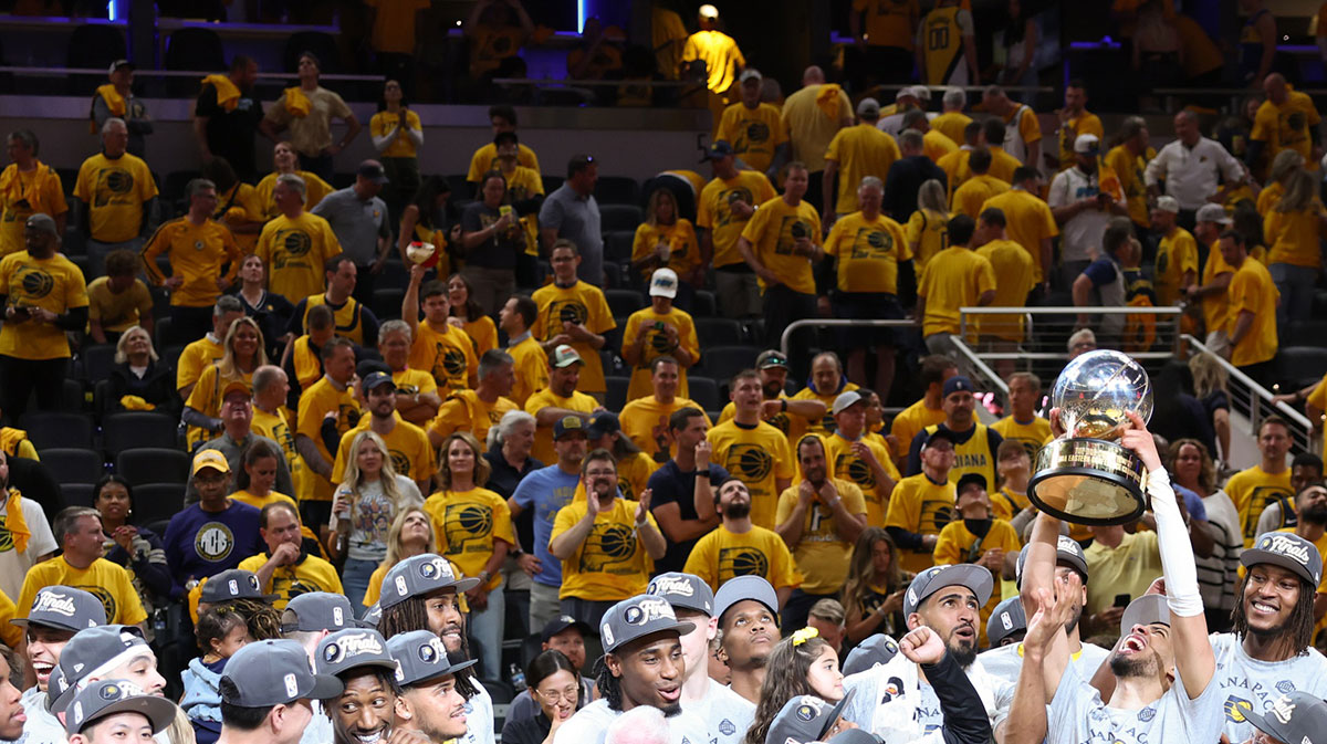 The Indiana Pacers react after receiving the trophy after game six of the eastern conference finals against the New York Knicks.