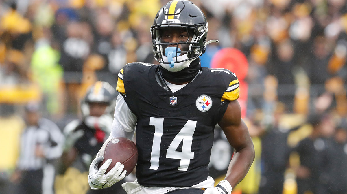 Pittsburgh Steelers wide receiver George Pickens (14) runs to score a touchdown on a pass reception against the Jacksonville Jaguars during the third quarter at Acrisure Stadium. Jacksonville won 20-10.