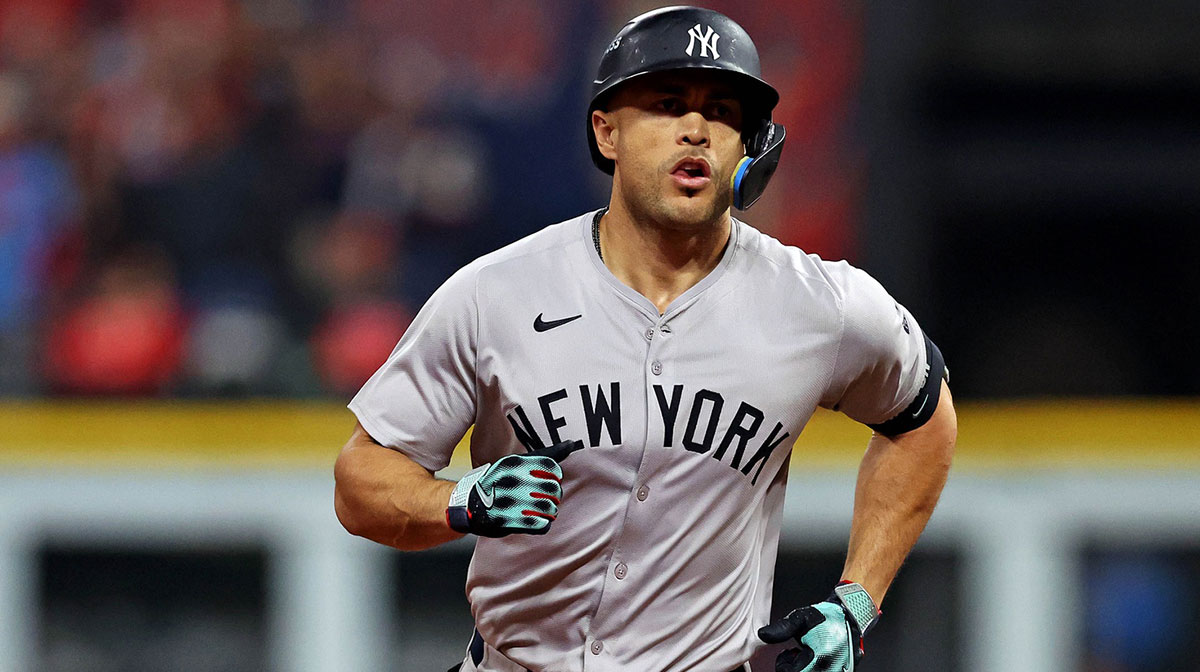 New York Yankees designated hitter Giancarlo Stanton (27) runs the bases after hitting a two run home run during the sixth inning against the Cleveland Guardians during game five of the ALCS for the 2024 MLB playoffs at Progressive Field.