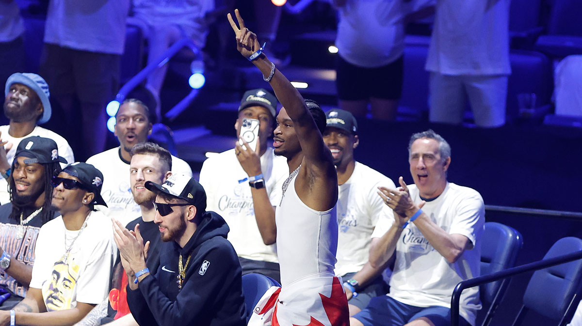Oklahoma City Thunder guard Shai Gilgeous-Alexander (2) enters the stage for the Champions Opening Ceremony for the parade inside the Paycom Center.