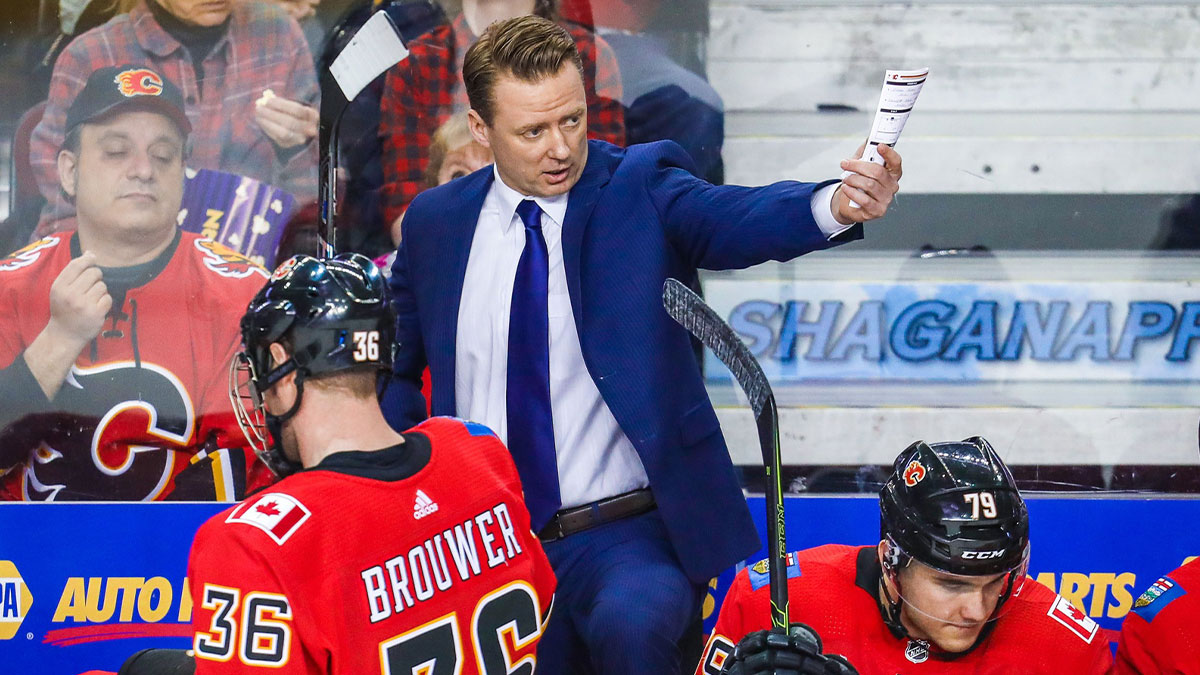 Calgary Flames head coach Glen Gulutzan on his bench against the Arizona Coyotes during the first period at Scotiabank Saddledome.