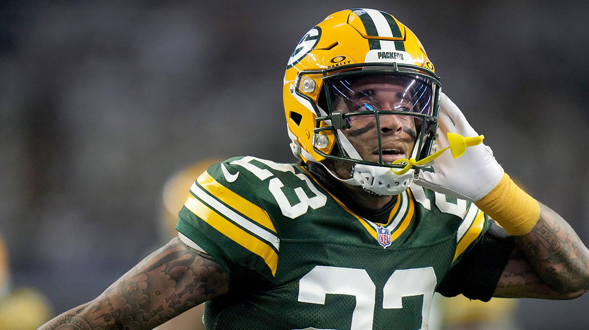 Green Bay Packers cornerback Jaire Alexander (23) reacts after intercepting a pass during the first quarter of the wild card playoff game against the Dallas Cowboys Sunday, January 14, 2024 at AT&T Stadium in Arlington, Texas.