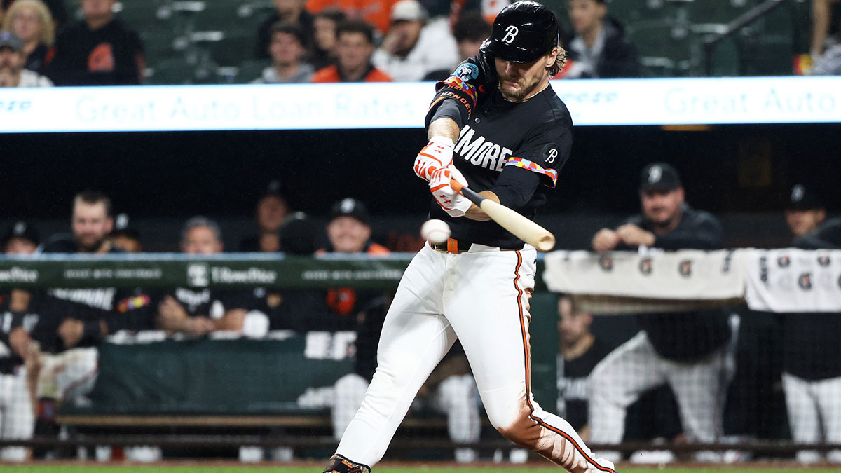 Baltimore Orioles shortstop Gunnar Henderson (2) hits a single during the seventh inning against the Tampa Bay Rays at Oriole Park at Camden Yards.