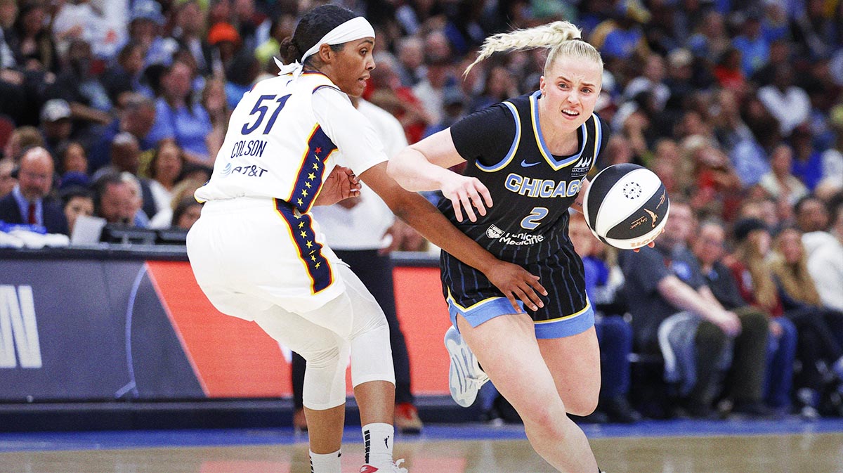 Chicago Sky guard Hailey Van Lith (2) drives to the basket against Indiana Fever guard Sydney Colson (51) during the second half of a WNBA game at United Center.