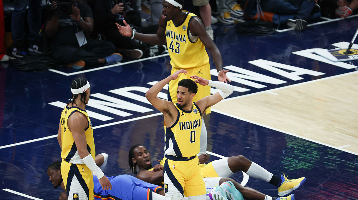 Indiana Pacers center Myles Turner (33), guard Tyrese Haliburton (0) and forward Pascal Siakam (43) react after a play against the Oklahoma City Thunder in the first quarter during game six of the 2025 NBA Finals at Gainbridge Fieldhouse.