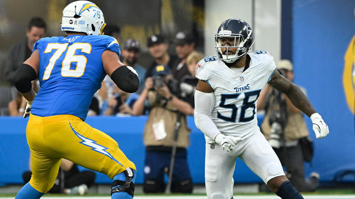 Tennessee Titans linebacker Harold Landry III (58) and Los Angeles Chargers offensive tackle Joe Alt (76) during the third quarter at SoFi Stadium.