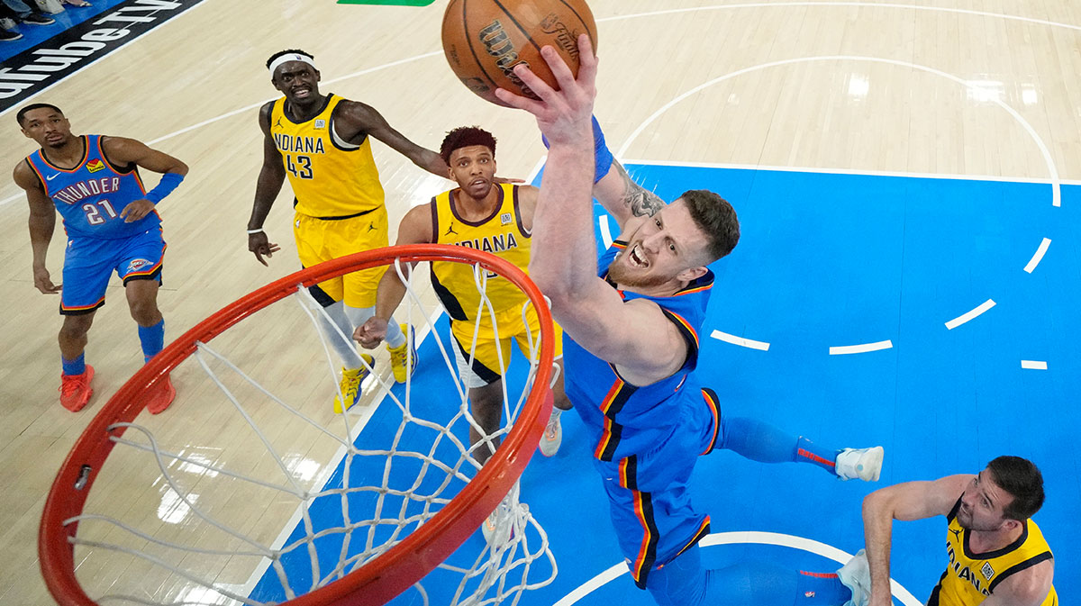 Oklahoma City Thunder center Isaiah Hartenstein (55) drives to the basket against the Indiana Pacers during the first half of game seven of the 2025 NBA Finals at Paycom Center.