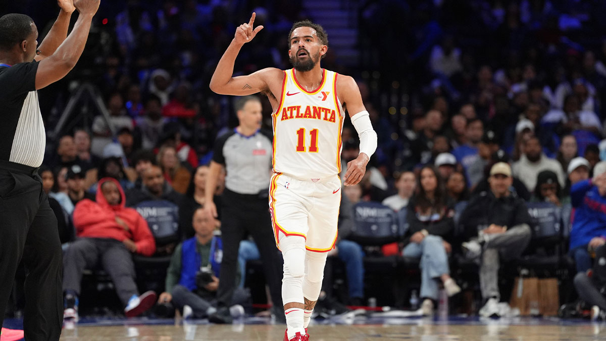 Atlanta Hawks guard Trae Young (11) reacts after scoring against the Philadelphia 76ers in the fourth quarter at Wells Fargo Center.