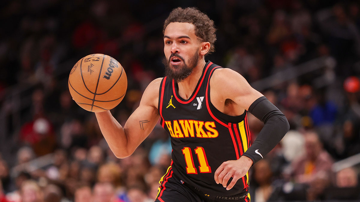 Atlanta Hawks guard Trae Young (11) drives to the basket against the Toronto Raptors in the second quarter at State Farm Arena.